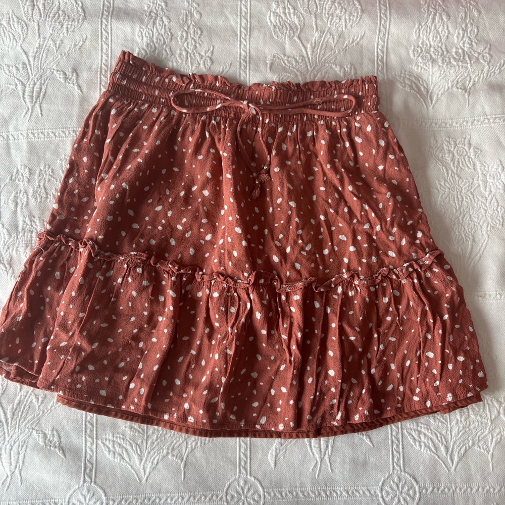 size medium pink and white pattern skirt
